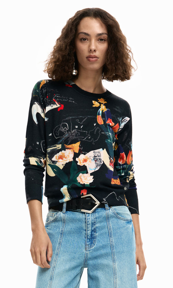 Abstract floral art print lightweight long sleeve knit sweater with crew neckline and ribbed trim styled with denim.