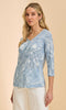 Soft blue printed Henley V-neck top with 3/4 sleeves