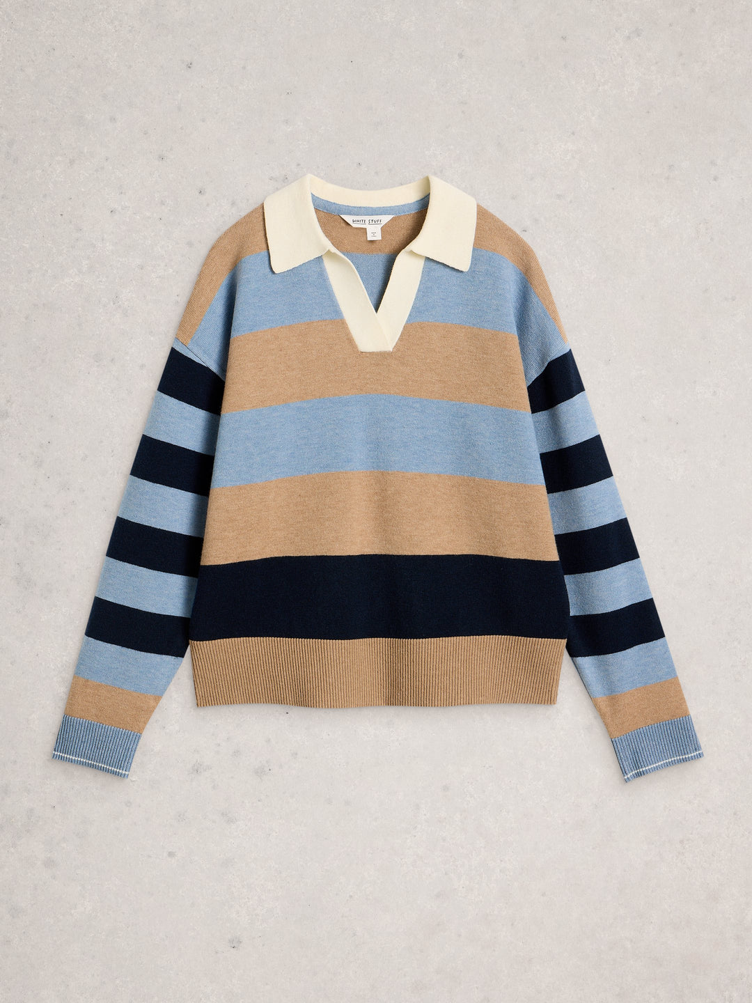 Striped sweater with a collar on a light gray background