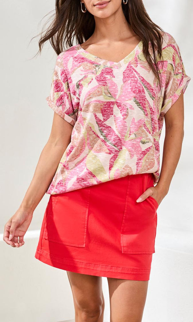 Short sleeve knit top with tonal floral appliqué embroidery and relaxed fit silhouette