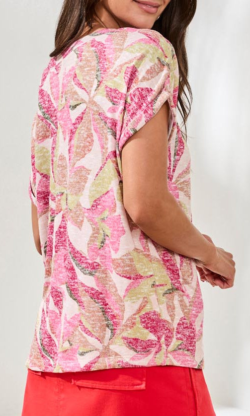 Short sleeve knit top with tonal floral appliqué embroidery and relaxed fit silhouette