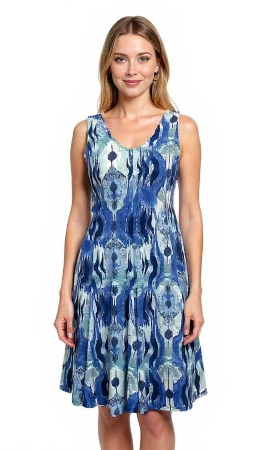 Woman wearing a blue patterned dress on a white background
