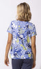 Tropical floral V-neck short sleeve top with relaxed fit and lightweight fabric.