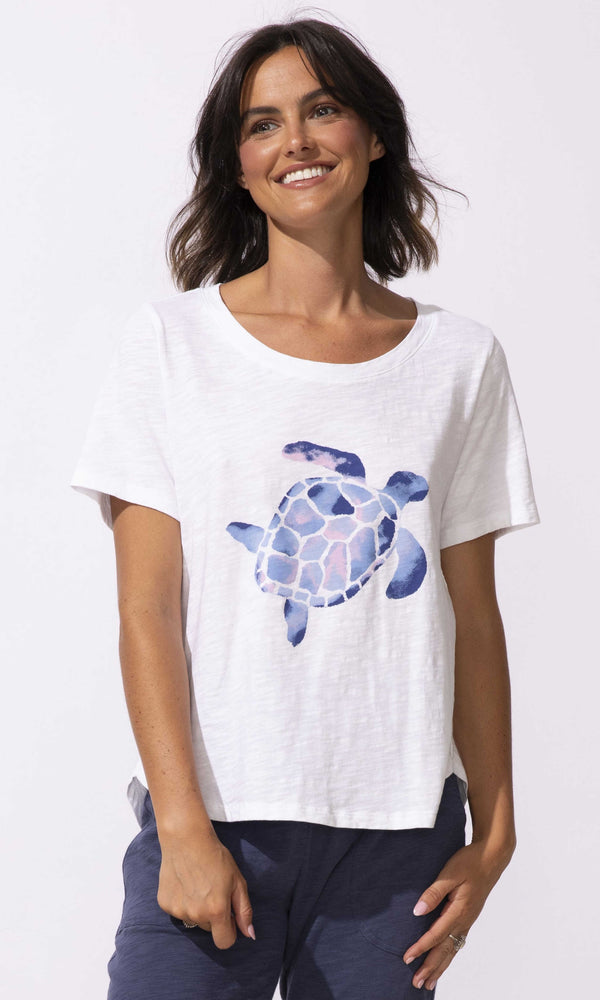 Sea turtle graphic short sleeve t-shirt with relaxed fit and scoop neckline.