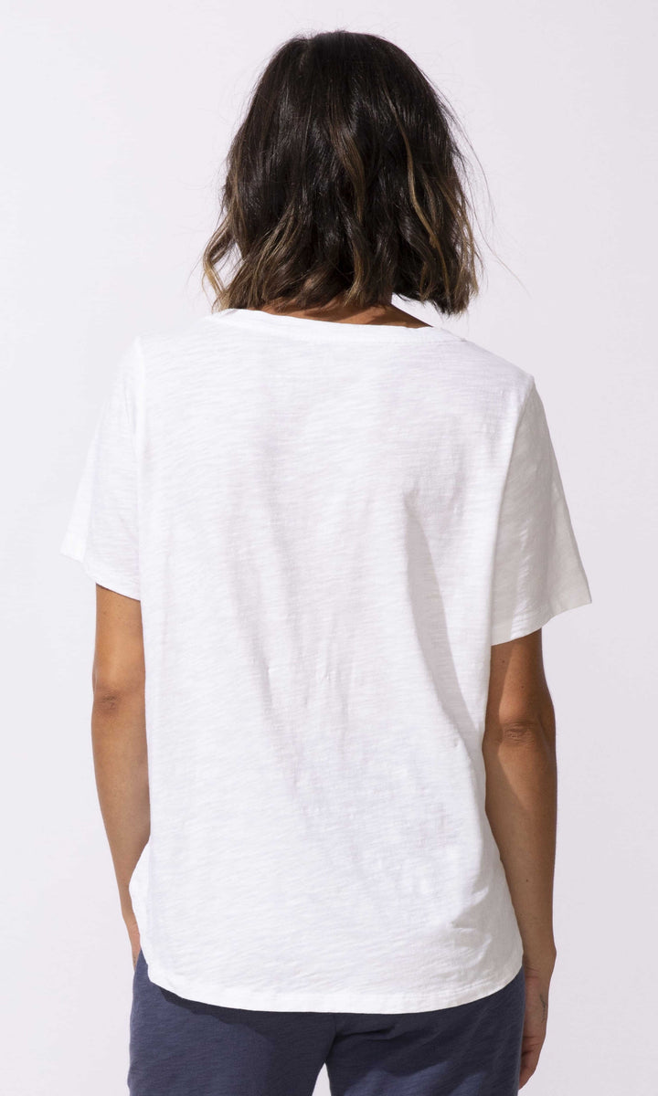 Sea turtle graphic short sleeve t-shirt with relaxed fit and scoop neckline.