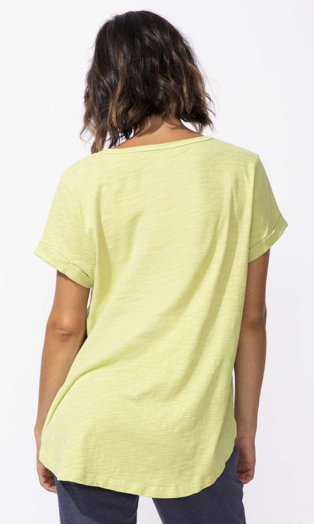 Floral graphic scoop neck short sleeve t-shirt with relaxed fit and curved hem.