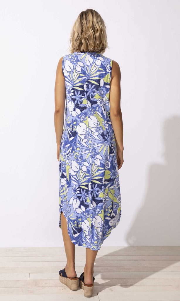 tropical floral sleeveless midi dress with V-neck and curved hem, summer resort outfit.