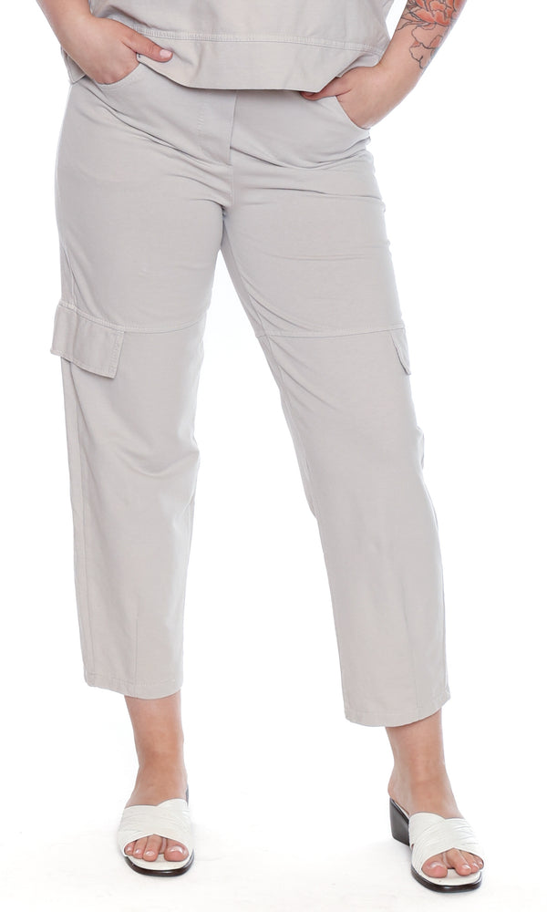 Light gray cargo pants worn by a person on a white background
