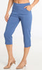 Blue capri pants worn by a person on a white background
