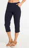 Navy blue capri pants worn by a person on a white background