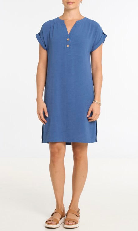 Woman wearing a blue dress on a white background