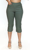 Green capri pants worn by a person on a white background