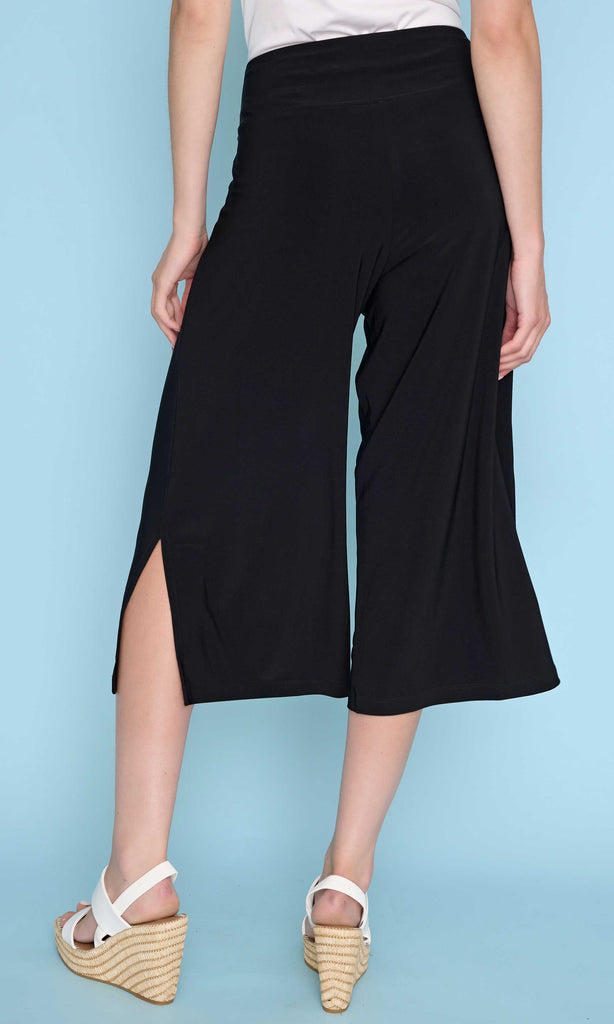 pull-on wide leg crop pants with elastic waistband and side slit detail.