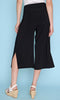 pull-on wide leg crop pants with elastic waistband and side slit detail.