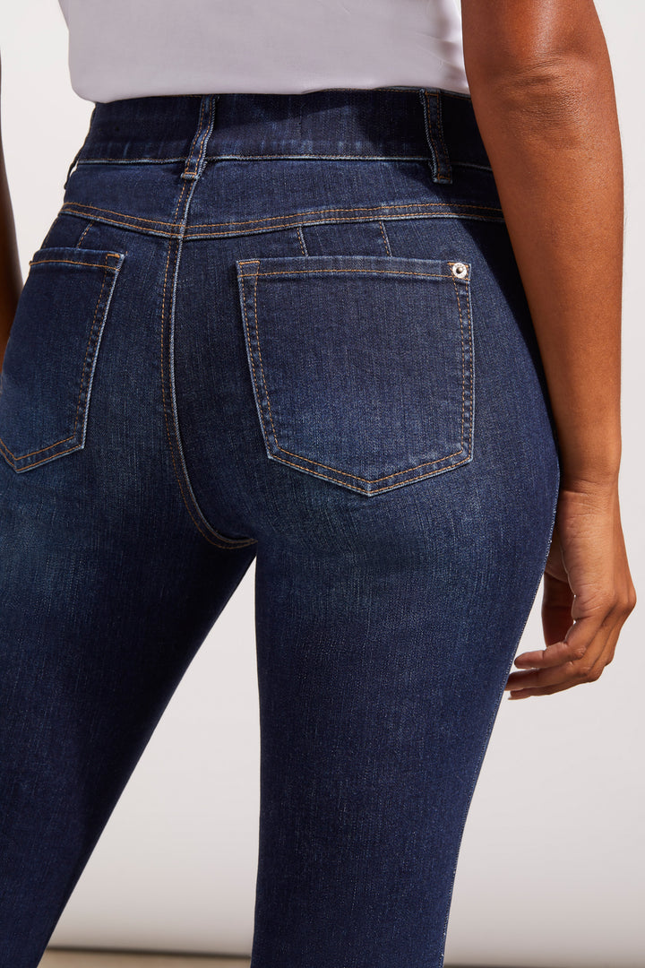 The back of a pair of curvy straight leg jeans with a mid-rise waist and five pockets, made from sustainably sourced cotton and Repreve polyester.