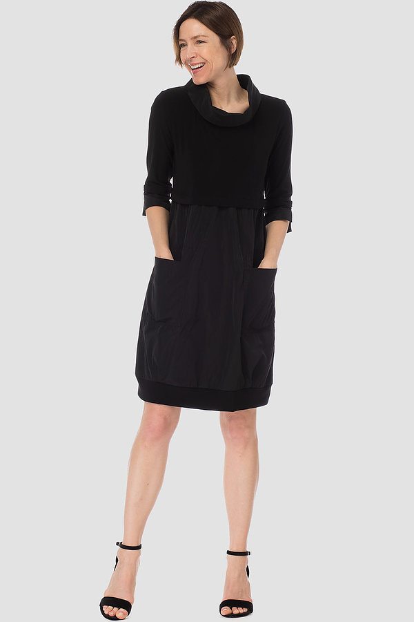 A knee-length navy dress with a mock neckline, long cuffed sleeves, and front pockets.